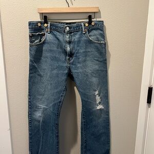 Levi's Relaxed Fit Distressed Blue Jeans with Suspender Buttons